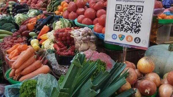 QR-код для оплаты криптовалютой на Бессарабском рынке в Киеве