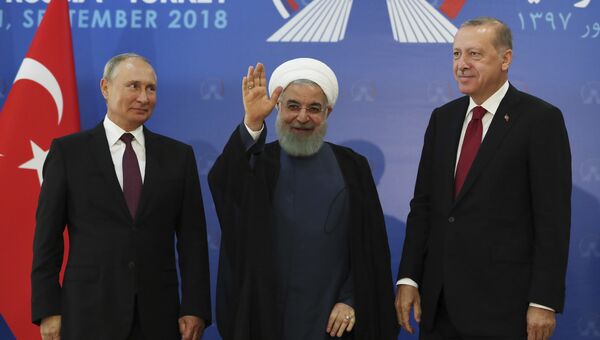 Президент России Владимир Путин, Иран Хасан Рухани и Турции Реджеп Тайип Эрдоган во время встречи в Тегеране. 7 сентября 2018 Президент России Владимир Путин, Иран Хасан Рухани и Турции Реджеп Тайип Эрдоган во время встречи в Тегеране. 7 сентября 2018