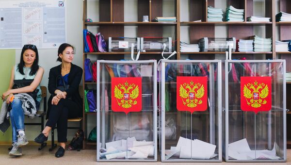 Урны в единый день голосования на избирательном участке. Архивное фото Урны в единый день голосования на избирательном участке. Архивное фото