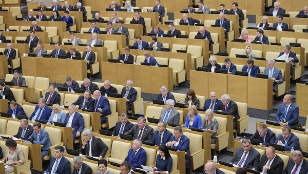 Депутаты на пленарном заседании Государственной Думы. Архивное фото Депутаты на пленарном заседании Государственной Думы. Архивное фото