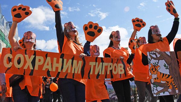 Участники праздничных мероприятий, посвященных Дню тигра, во Владивостоке Участники праздничных мероприятий, посвященных Дню тигра, во Владивостоке