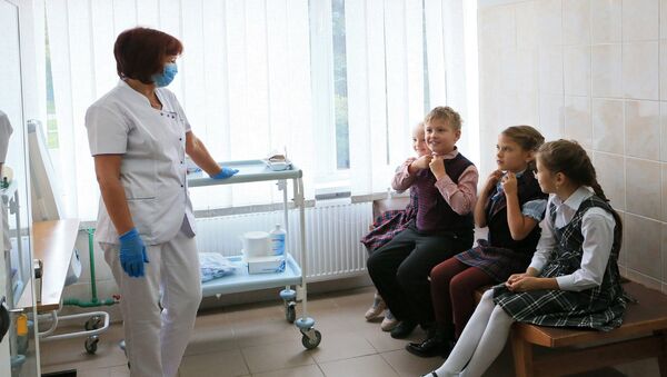Школьники на вакцинации против гриппа Школьники на вакцинации против гриппа