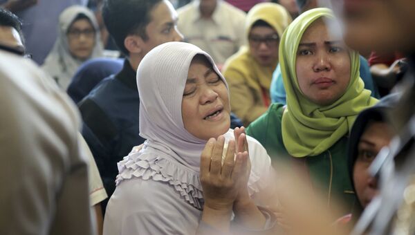 Родственники пассажиров самолета Boeing 737, потерпевшего крушение в Индонезии. 29 октября 2018 года Родственники пассажиров самолета Boeing 737, потерпевшего крушение в Индонезии. 29 октября 2018 года