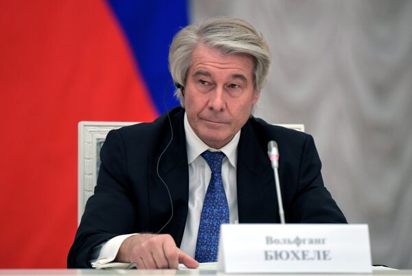 Председатель Восточного комитета германской экономики Вольфганг Бюхеле во время встречи президента РФ Владимира Путина с представителями крупнейших немецких предприятий. 1 ноября 2018 Председатель Восточного комитета германской экономики Вольфганг Бюхеле во время встречи президента РФ Владимира Путина с представителями крупнейших немецких предприятий. 1 ноября 2018