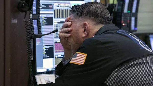 Трейдер на Нью-Йоркской фондовой бирже. 26 октября 2018