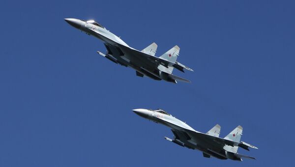 Многофункциональные истребители Су-35. Архивное фото Многофункциональные истребители Су-35. Архивное фото