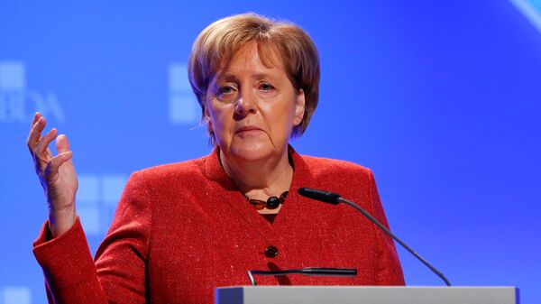 Канцлер Германии Ангела Меркель выступает перед союранием Конфедерации ассоциаций работодателей Германии во время Дня работодателей в Берлине, Германия. 22 ноября 2018 Канцлер Германии Ангела Меркель выступает перед союранием Конфедерации ассоциаций работодателей Германии во время Дня работодателей в Берлине, Германия. 22 ноября 2018