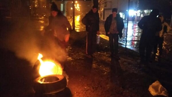Участник акции у здания консульства России во Львове, Украина. 26 ноября 2018 Участник акции у здания консульства России во Львове, Украина. 26 ноября 2018