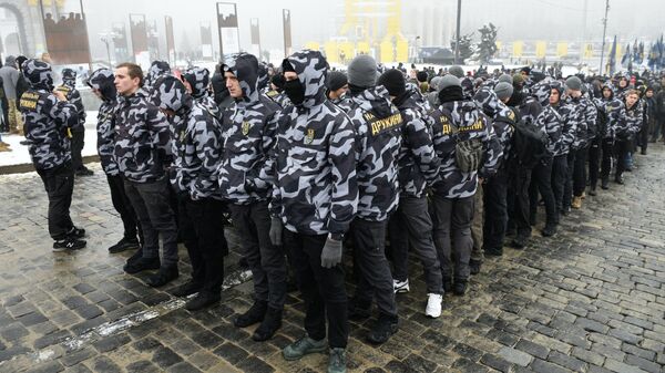 Участники акции за введения военного положения на Украине, организованной партией Национальный корпус в Киеве. 26 ноября 2018 Участники акции за введения военного положения на Украине, организованной партией Национальный корпус в Киеве. 26 ноября 2018