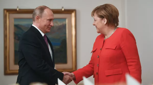 Президент России Владимир Путин и канцлер ФРГ Ангела Меркель Президент России Владимир Путин и канцлер ФРГ Ангела Меркель