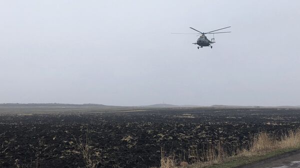 Военный вертолет на месте крушения самолета Су-25 в Мараликском районе Армении Военный вертолет на месте крушения самолета Су-25 в Мараликском районе Армении
