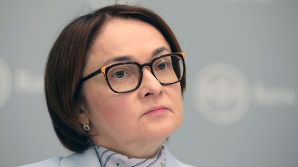 Председатель Центрального банка РФ Эльвира Набиуллина во время пресс-конференции по итогам заседания Совета директоров ЦБ РФ. 14 декабря 2018 Председатель Центрального банка РФ Эльвира Набиуллина во время пресс-конференции по итогам заседания Совета директоров ЦБ РФ. 14 декабря 2018