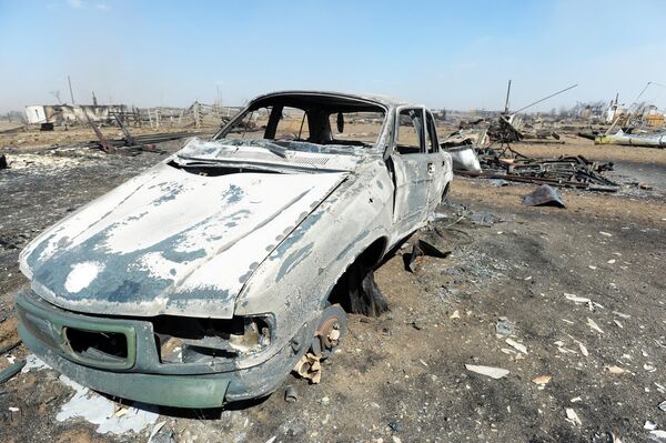 Сгоревший в результате пожара автомобиль в селе Усть-Ималка Ононского района Забайкальского края Сгоревший в результате пожара автомобиль в селе Усть-Ималка Ононского района Забайкальского края