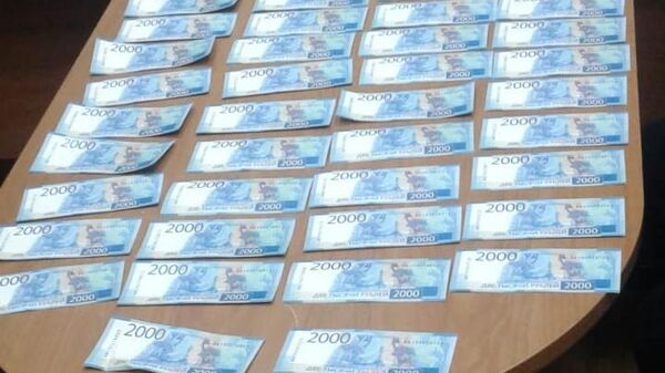 Поддельные купюры, изъятые полицейскими Череповца у фальшивомонетчиков Поддельные купюры, изъятые полицейскими Череповца у фальшивомонетчиков
