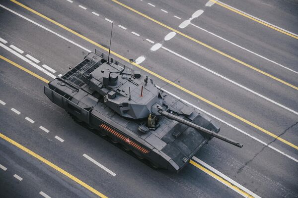 Танк Т-14 Армата перед началом репетиции военного парада, посвященного 74-й годовщине Победы в Великой Отечественной войне Танк Т-14 Армата перед началом репетиции военного парада, посвященного 74-й годовщине Победы в Великой Отечественной войне