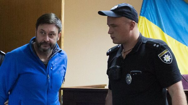 Руководитель портала РИА Новости Украина Кирилл Вышинский на заседании Подольского районного суда Киева. 15 июля 2019 Руководитель портала РИА Новости Украина Кирилл Вышинский на заседании Подольского районного суда Киева. 15 июля 2019