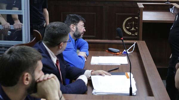Руководитель портала РИА Новости Украина Кирилл Вышинский на заседании Подольского районного суда Киева. 19 июля 2019 Руководитель портала РИА Новости Украина Кирилл Вышинский на заседании Подольского районного суда Киева. 19 июля 2019