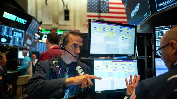Работа трейдеров на Нью-Йоркской фондовой бирже. 16 июля 2019<br />
