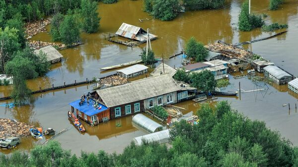 Затопленные дома в селе Норск в Селемджинском районе Амурской области Затопленные дома в селе Норск в Селемджинском районе Амурской области