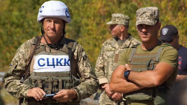 Члены совместного центра контроля и координации прекращения огня и стабилизации обстановки на Юго-Востоке Украины Члены совместного центра контроля и координации прекращения огня и стабилизации обстановки на Юго-Востоке Украины
