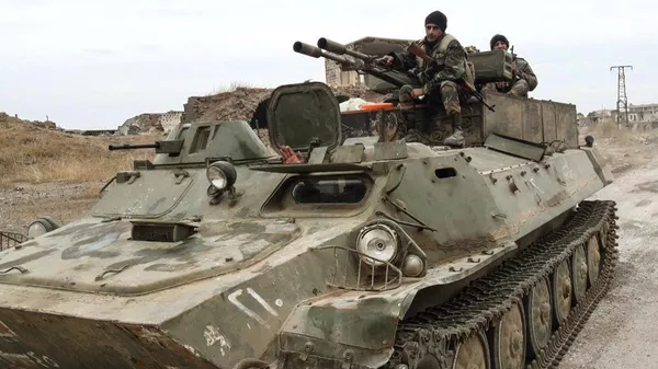 Военнослужащие сирийской армии в провинции Идлиб после освобождения от террористов населенного пункта Ум-эль-Халахель
