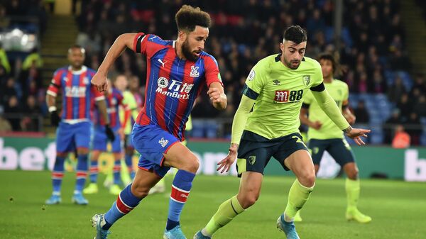 Crystal Palace's English midfielder Andros Townsend vies with Bournemouth's Spanish defender Diego Rico (R) during the English Premier League football match between Crystal Palace and Bournemouth at Selhurst Park in south London on December 3, 2019. (Photo by Glyn KIRK / AFP) / RESTRICTED TO EDITORIAL USE. No use with unauthorized audio, video, data, fixture lists, club/league logos or 'live' services. Online in-match use limited to 120 images. An additional 40 images may be used in extra time. No video emulation. Social media in-match use limited to 120 images. An additional 40 images may be used in extra time. No use in betting publications, games or single club/league/player publications. / Crystal Palace's English midfielder Andros Townsend vies with Bournemouth's Spanish defender Diego Rico (R) during the English Premier League football match between Crystal Palace and Bournemouth at Selhurst Park in south London on December 3, 2019. (Photo by Glyn KIRK / AFP) / RESTRICTED TO EDITORIAL USE. No use with unauthorized audio, video, data, fixture lists, club/league logos or 'live' services. Online in-match use limited to 120 images. An additional 40 images may be used in extra time. No video emulation. Social media in-match use limited to 120 images. An additional 40 images may be used in extra time. No use in betting publications, games or single club/league/player publications. /