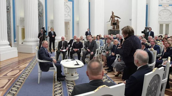 Президент РФ Владимир Путин во время встречи с региональными уполномоченными по правам человека