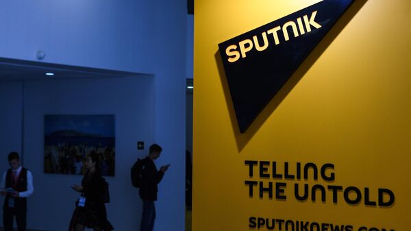 Логотип международного информационного агентства и радио Sputnik Логотип международного информационного агентства и радио Sputnik