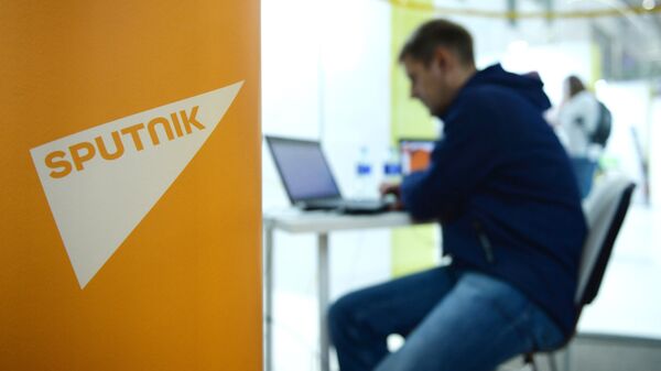 Логотип международного информационного агентства и радио Sputnik Логотип международного информационного агентства и радио Sputnik