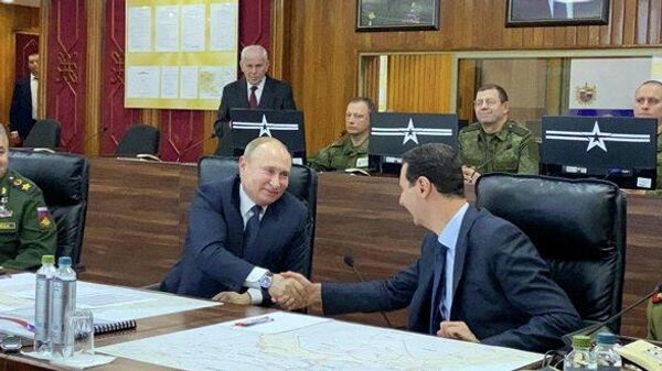 Президент России Владимир Путин и президент Сирийской Арабской Республики Башар Асад во время встречи. 7 января 2020 Президент России Владимир Путин и президент Сирийской Арабской Республики Башар Асад во время встречи. 7 января 2020