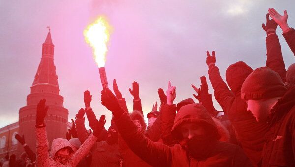 Акция на Манежной площади в память об убитом болельщике Спартака Егоре Свиридове. Архивное фото Акция на Манежной площади в память об убитом болельщике Спартака Егоре Свиридове. Архивное фото