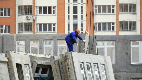 Строительство панельных домов. Архивное фото Строительство панельных домов. Архивное фото