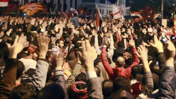 Акция протеста футбольных фанатов в Каире против беспорядков в Порт-Саиде Акция протеста футбольных фанатов в Каире против беспорядков в Порт-Саиде