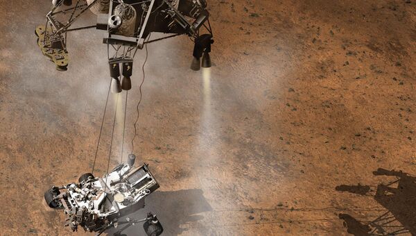Небесный кран опускает марсоход Curiosity на поверхность Марса Небесный кран опускает марсоход Curiosity на поверхность Марса