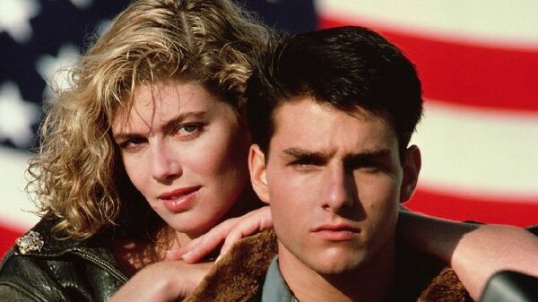Том Круз и Келли МакГиллис на сьемках фильма Топ Ган (Лучший стрелок) (1986) Том Круз и Келли МакГиллис на сьемках фильма Топ Ган (Лучший стрелок) (1986)