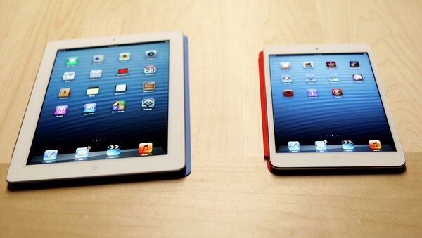 Планшет iPad mini и полноразмерный iPad Планшет iPad mini и полноразмерный iPad