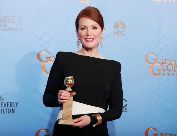 Актриса Джулианна Мур на церемонии вручения премии «Золотой глобус» Актриса Джулианна Мур на церемонии вручения премии «Золотой глобус»