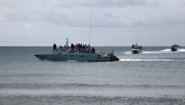 Патруль на море у места высадки боевиков в штате Сабах Патруль на море у места высадки боевиков в штате Сабах