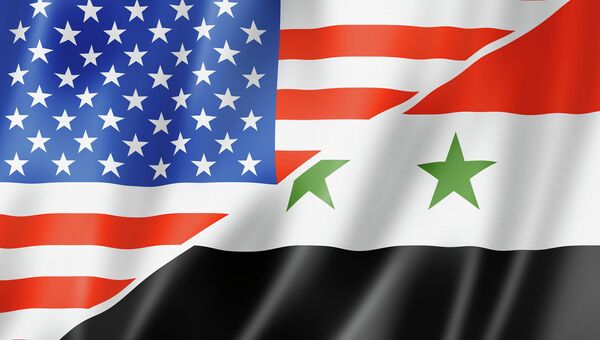 Флаги США и Сирии. Архивное фото Флаги США и Сирии. Архивное фото
