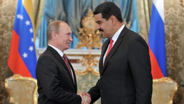 Президент России Владимир Путин (слева) и президент Боливарианской Республики Венесуэла Николас Мадуро Морос. Архивное фото