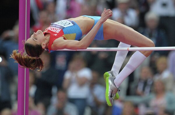 Российская спортсменка Анна Чичерова в финальных соревнованиях по легкой атлетике на ХХХ Олимпийских играх в Лондоне. Август 2012 года Российская спортсменка Анна Чичерова в финальных соревнованиях по легкой атлетике на ХХХ Олимпийских играх в Лондоне. Август 2012 года