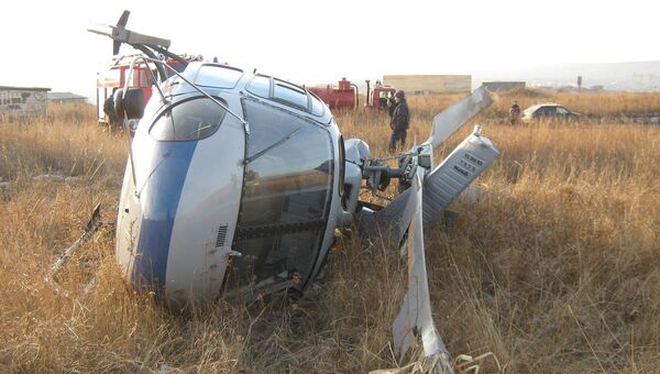 На месте падения вертолета АС-350 в городе Ужур Красноярского края На месте падения вертолета АС-350 в городе Ужур Красноярского края