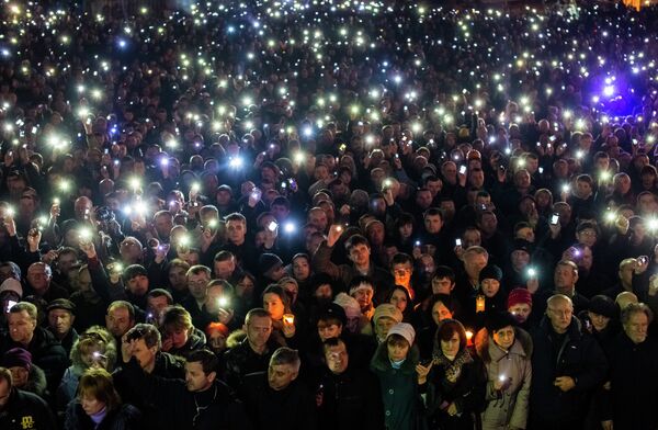 На площади Независимости на траурном мероприятии в память о погибших во время антиправительственной акции протеста На площади Независимости на траурном мероприятии в память о погибших во время антиправительственной акции протеста