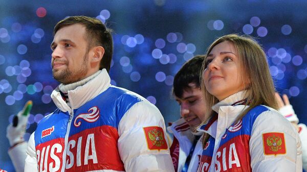 Олимпийский чемпион соревнований по скелетону Александр Третьяков и бронзовый призер соревнований по скелетону Елена Никитина Олимпийский чемпион соревнований по скелетону Александр Третьяков и бронзовый призер соревнований по скелетону Елена Никитина