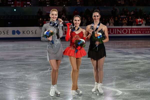 Мария Сотскова, Алина Загитова и Кейтлин Осмонд (слева направо) Мария Сотскова, Алина Загитова и Кейтлин Осмонд (слева направо)