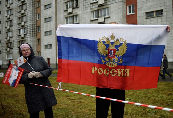 Жители Северодвинска во время эстафеты олимпийского огня Жители Северодвинска во время эстафеты олимпийского огня