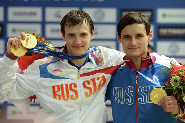 Российский спортсмен Алексей Черемисинов (слева), занявший первое место, и российский спортсмен Тимур Сафин, Российский спортсмен Алексей Черемисинов (слева), занявший первое место, и российский спортсмен Тимур Сафин,