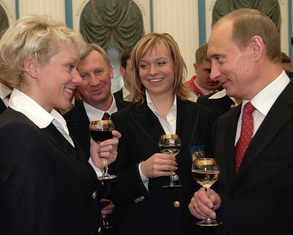 Ольга Зайцева и Владимир Путин (на первом плане) Ольга Зайцева и Владимир Путин (на первом плане)